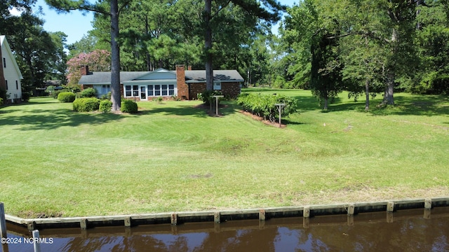 view of yard with a water view