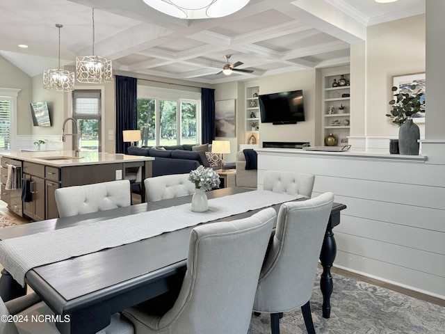 283 Golfview Ct SW, Supply, NC 28462 - dining area with built in features, coffered ceiling, ceiling fan, wood finished floors, and beam ceiling