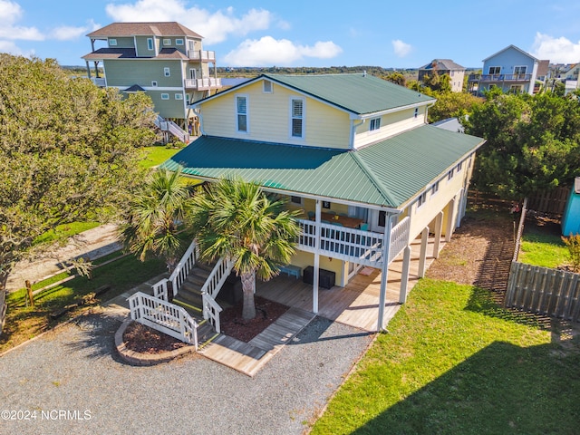 back of house with covered porch