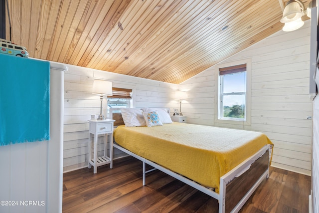 bedroom featuring wooden ceiling, wooden walls, multiple windows, and dark wood finished floors