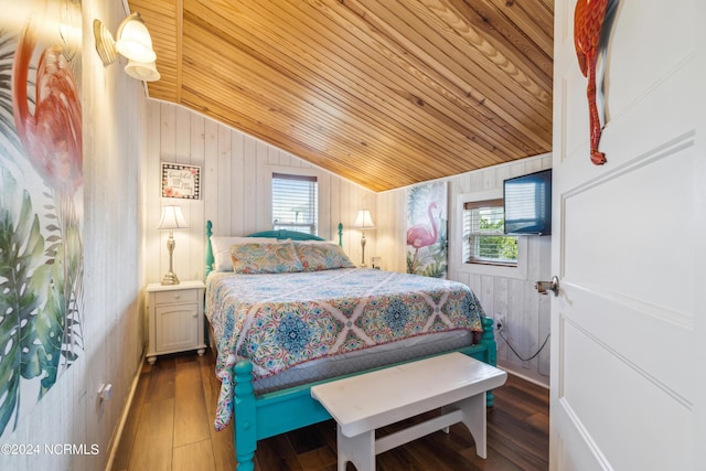 bedroom with wooden ceiling, vaulted ceiling, dark wood-style flooring, and wood walls