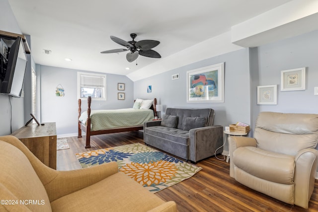 bedroom with dark wood-type flooring, visible vents, baseboards, vaulted ceiling, and a ceiling fan