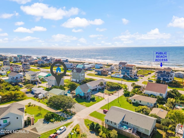 aerial view with a residential view and a water view