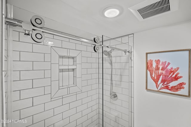 bathroom featuring walk in shower