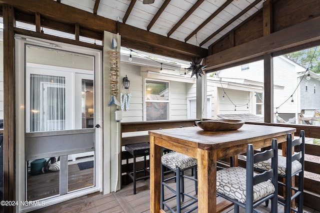 wooden deck with an outdoor bar