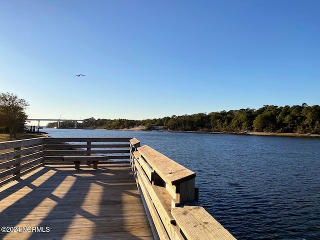 dock area featuring a water view