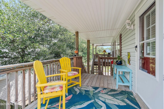 wooden terrace featuring a porch