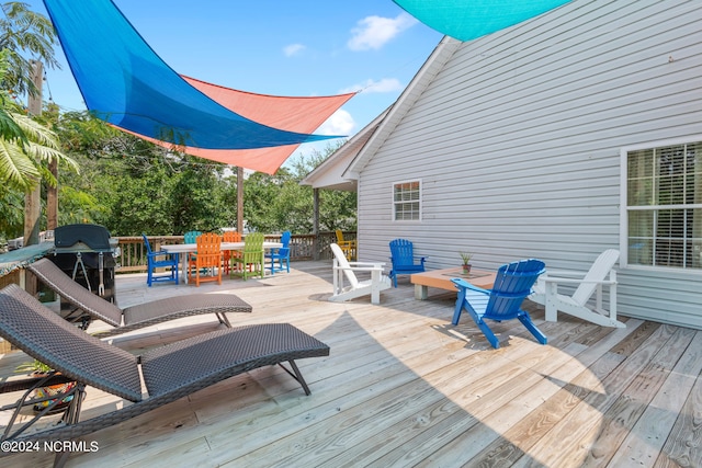 wooden deck with area for grilling