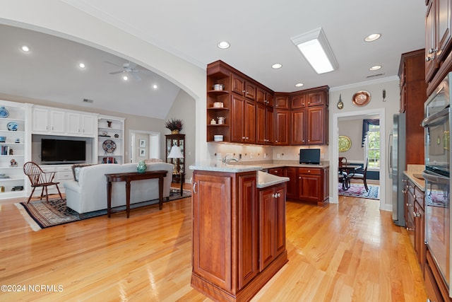 kitchen with crown molding, stainless steel appliances, decorative backsplash, ceiling fan, and light hardwood / wood-style floors