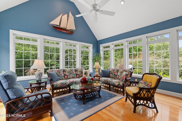 sunroom / solarium featuring vaulted ceiling and ceiling fan