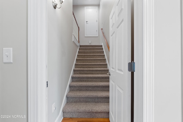 staircase with baseboards