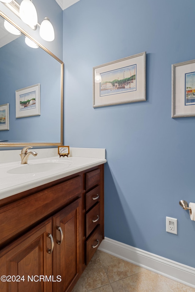 bathroom featuring tile patterned flooring and vanity