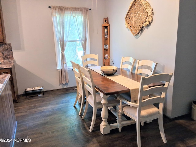 dining space with dark wood-style floors