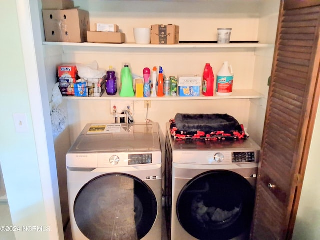 laundry room with laundry area and washer and dryer