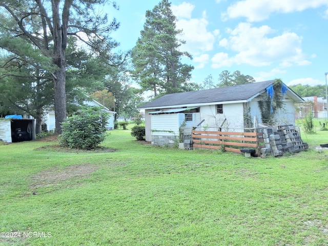 exterior space with a yard