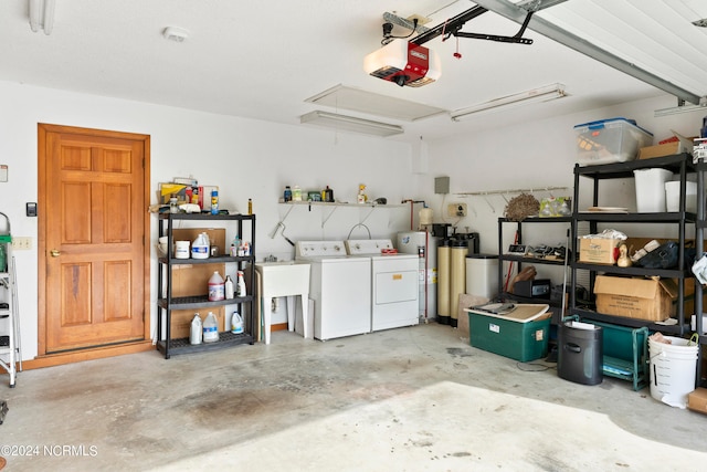 garage featuring a garage door opener and washing machine and dryer