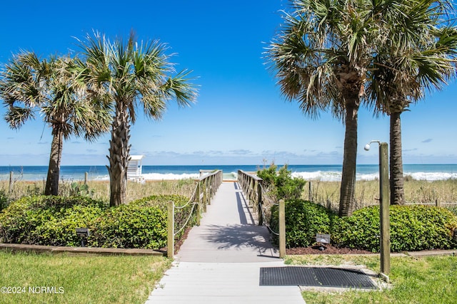 view of water feature with a beach view