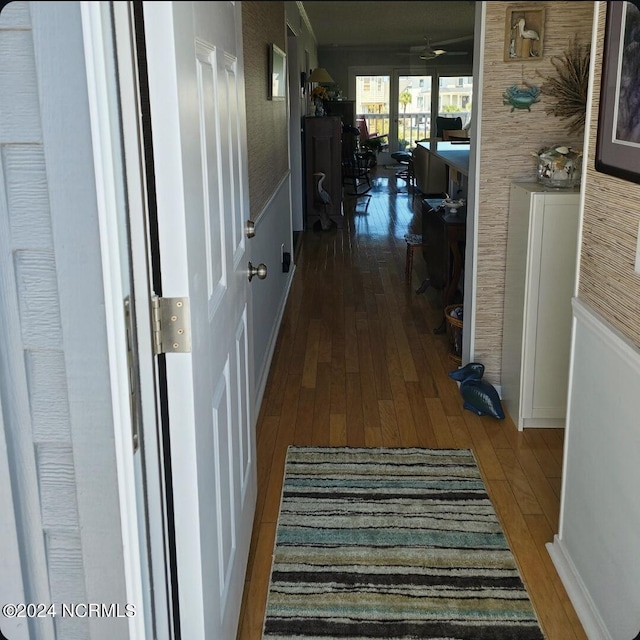 corridor featuring hardwood / wood-style flooring