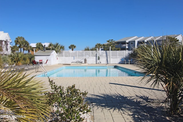 view of pool with a patio area