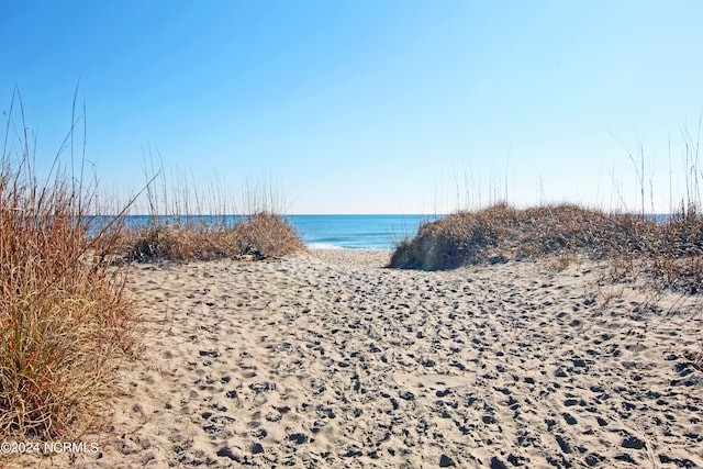 property view of water with a beach view