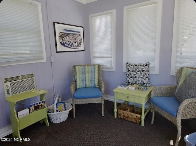 living area featuring carpet flooring