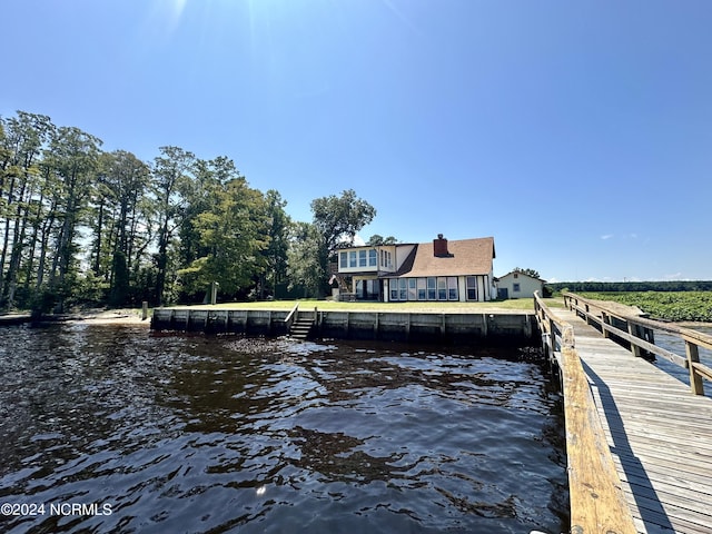 dock area with a water view