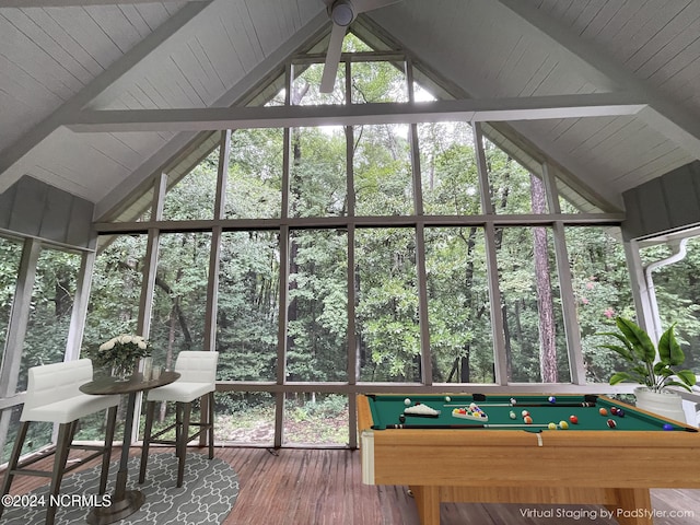 sunroom / solarium with billiards and beam ceiling