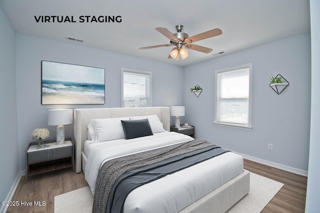 bedroom featuring ceiling fan and hardwood / wood-style flooring