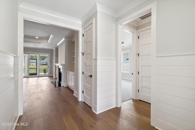 5037 Saltgrass Cv, Leland, NC 28451 - hall featuring crown molding, dark wood finished floors, and a raised ceiling