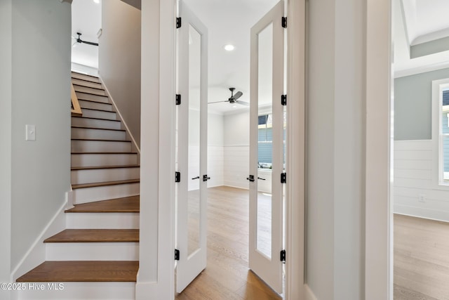 5037 Saltgrass Cv, Leland, NC 28451 - stairway featuring ceiling fan, wood finished floors, recessed lighting, and french doors