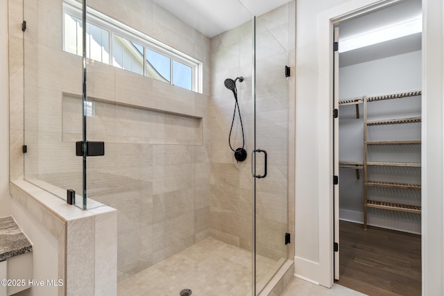 5037 Saltgrass Cv, Leland, NC 28451 - bathroom with a shower stall and a spacious closet