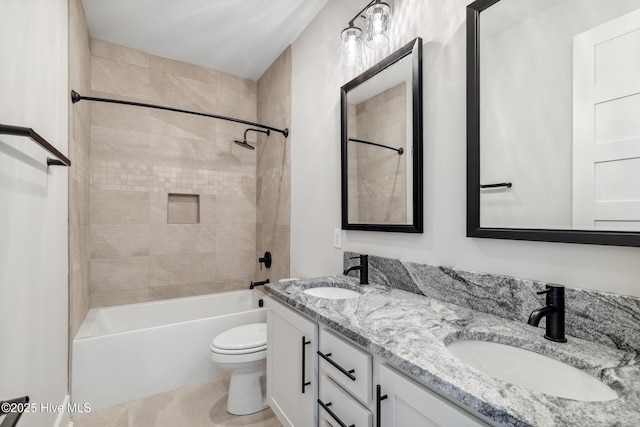 5037 Saltgrass Cv, Leland, NC 28451 - bathroom featuring toilet, double vanity, and bathing tub / shower combination