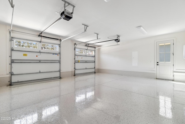 5037 Saltgrass Cv, Leland, NC 28451 - garage featuring a garage door opener