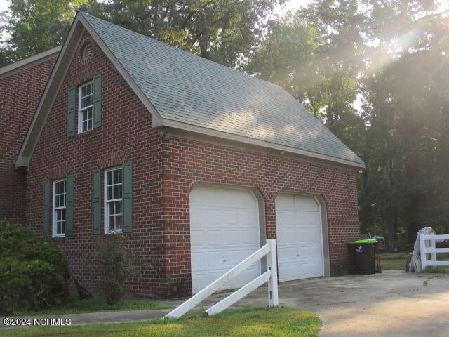 garage with driveway