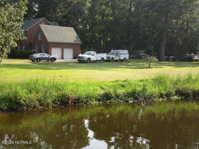 exterior space with a water view