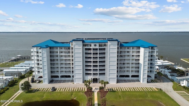 view of property with a water view