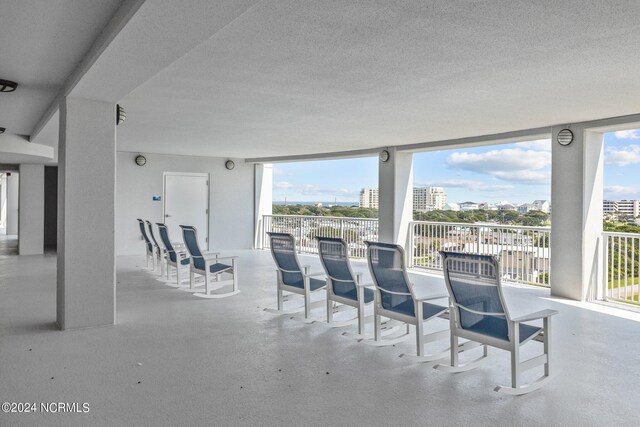 view of patio with a balcony