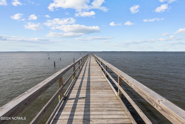 dock area featuring a water view