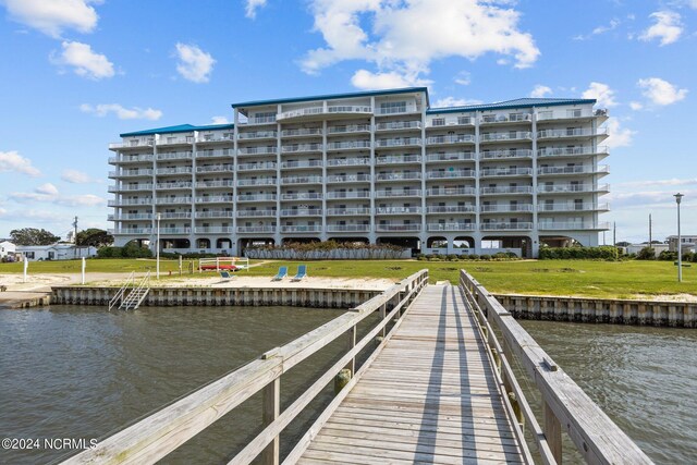 dock area featuring a water view