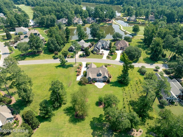 aerial view featuring a water view and a residential view