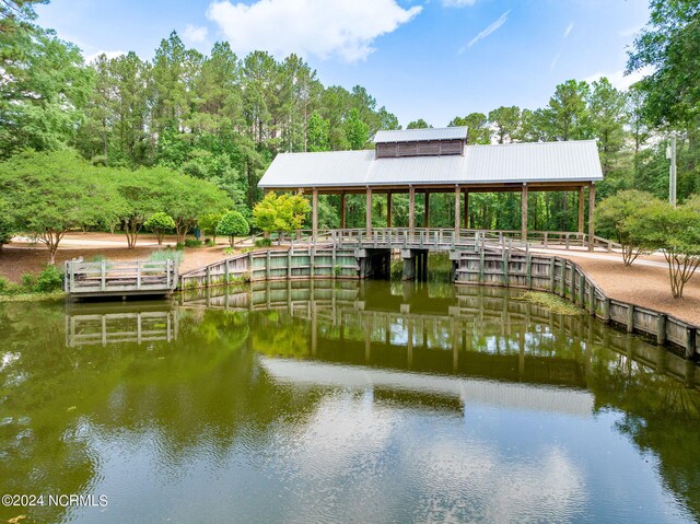 view of dock with a water view