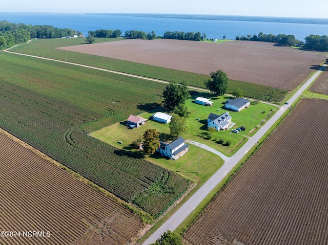 drone / aerial view featuring a water view and a rural view