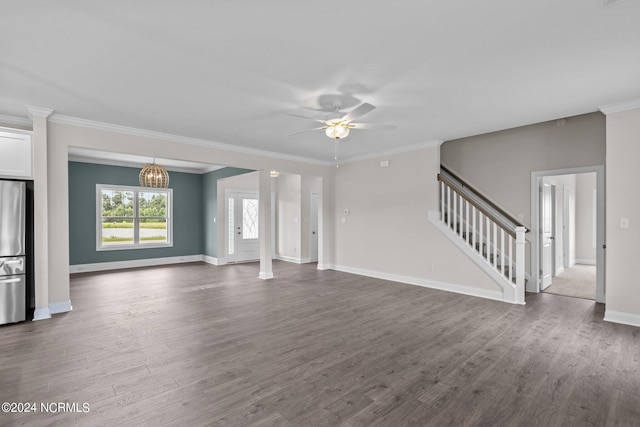 unfurnished living room with ornamental molding, ceiling fan with notable chandelier, and wood-type flooring