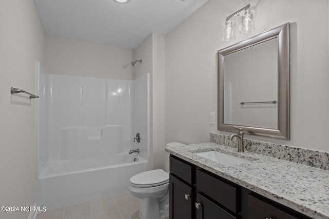 full bathroom featuring bathing tub / shower combination, toilet, vanity, and tile patterned floors