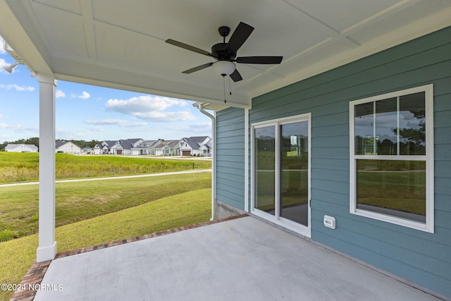 view of patio featuring ceiling fan