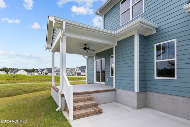 view of patio with ceiling fan