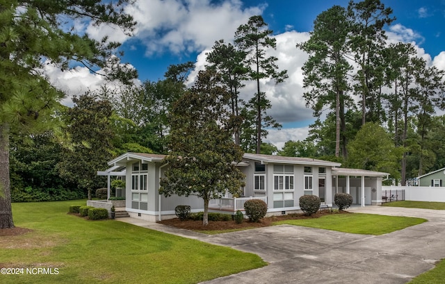 view of front of home with a front yard