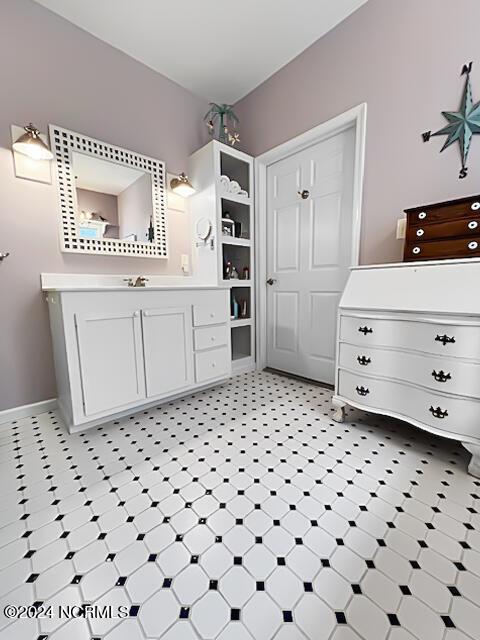 bathroom featuring tile patterned floors and vanity