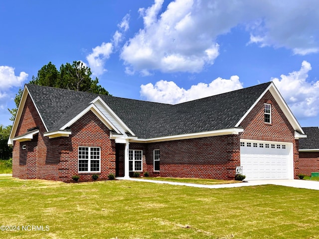 view of front of house featuring a garage, brick siding, a shingled roof, concrete driveway, and a front yard