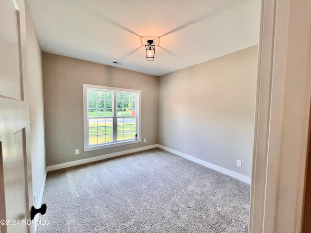 3701 Greystone Dr, Rocky Mount, NC 27804 - carpeted spare room with visible vents and baseboards